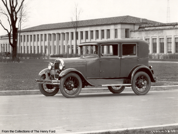 Here we see two of Ford Motor Company's 1928 models Model A Fordor Sedan 